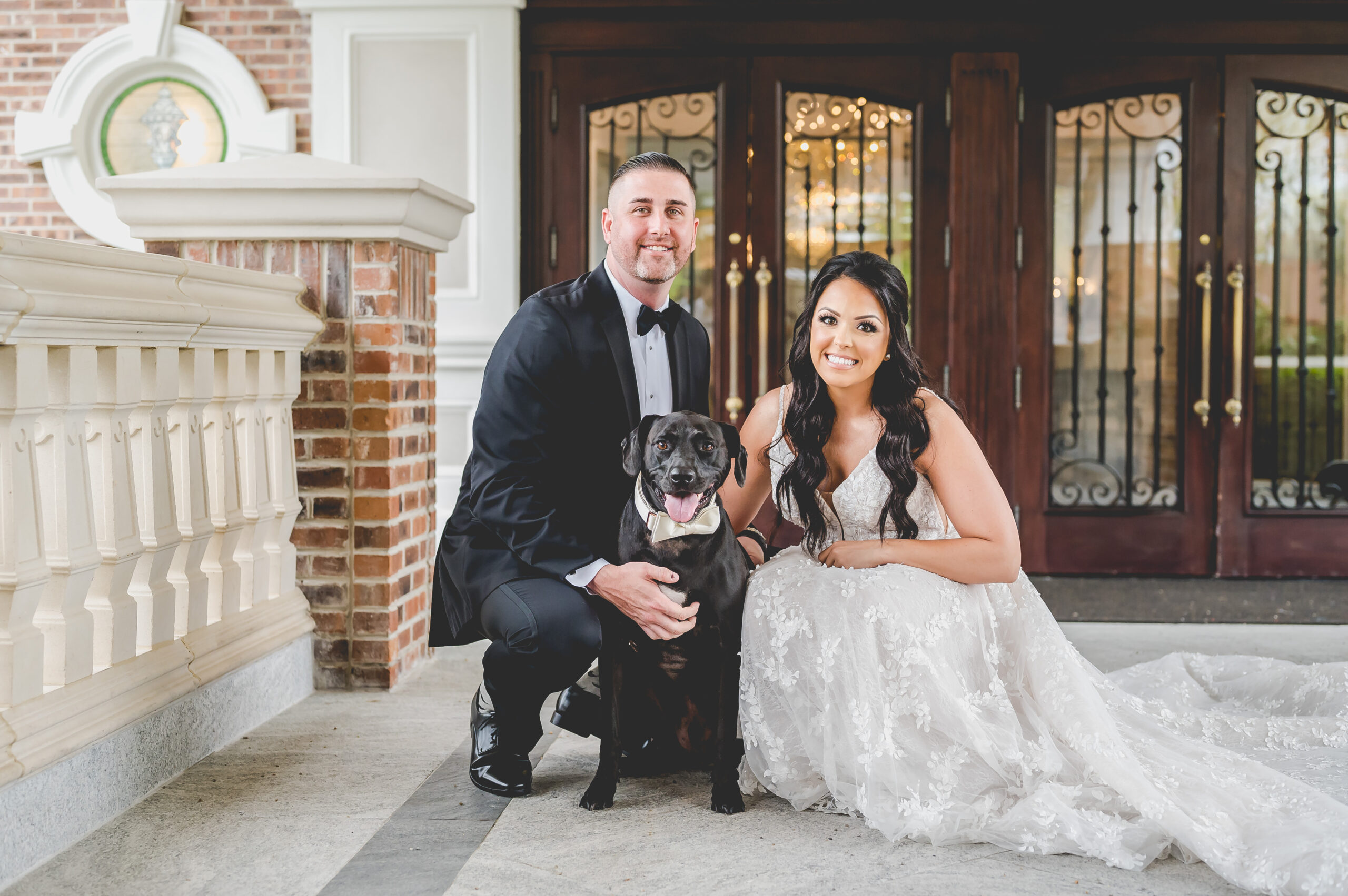 Bride and groom with their dog at The Rockleigh